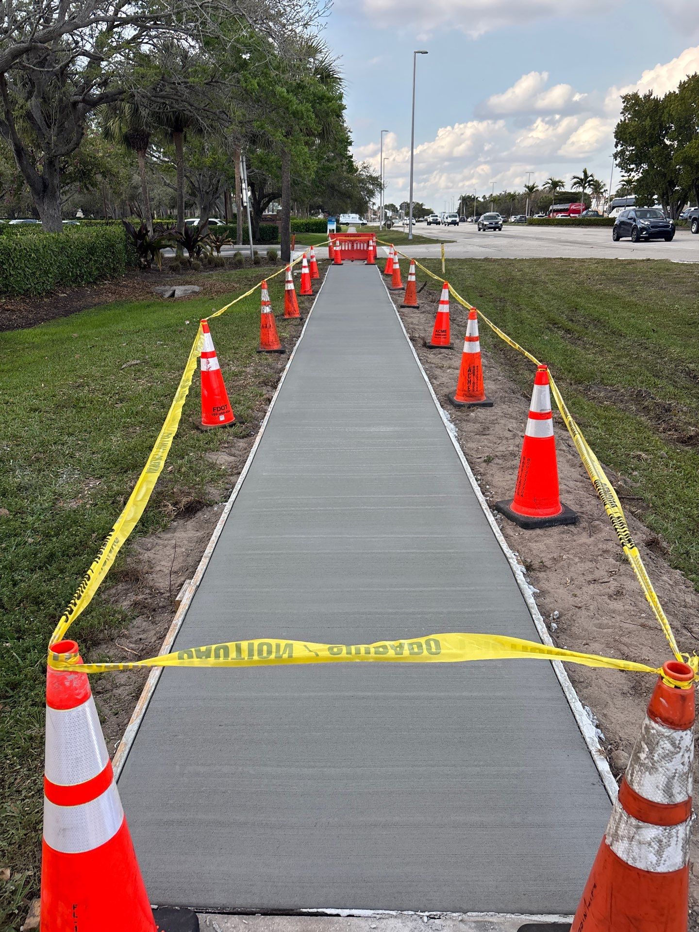 Fresh smooth concrete sidewalk after completion